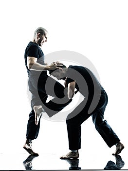 Men krav maga fighters fighting isolated