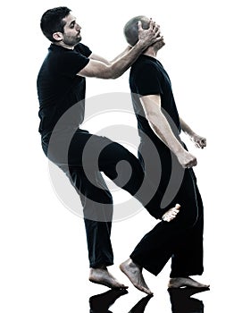 Men krav maga fighters fighting isolated