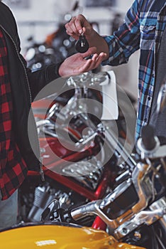 Men in motorbike salon