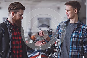 Men in motorbike salon