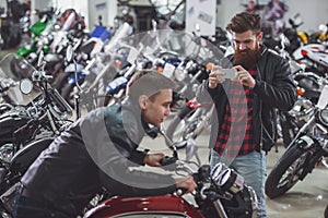 Men in motorbike salon