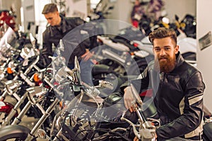 Men in motorbike salon