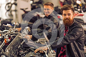 Men in motorbike salon