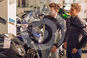 Men in motorbike salon