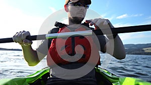 Men Paddling in the Kayak. Summer Watersport