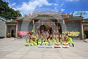 Men performs the Dragon dancing to practise prepare for lunar New Year at a Pagoda