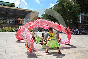 Men performs the Dragon dancing to practise prepare for lunar New Year at a Pagoda