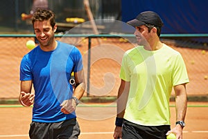 Men, player and competition on tennis court, athlete and ball or equipment for professional match. Fitness, outdoor and