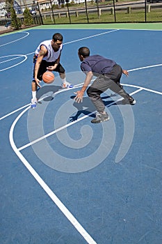 Men Playing Basketball