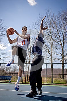 Men Playing Basketball