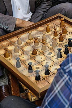 men playing boardgames