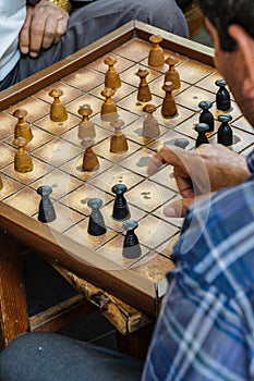 men playing boardgames