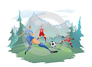 Men playing football on the background of a mountain landscape. Football players kick the ball. Outdoor activities