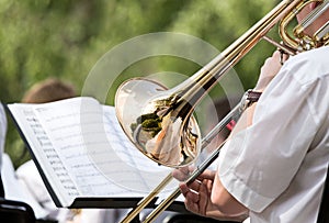 Men playing his trombone