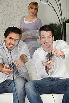 Men playing video games