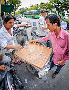 2 men playing Xiangqi in vietnam