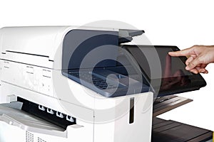 Men press the button of the copier. Man copying paper from Photocopier. Men use printing machines. man using photocopier