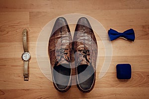Men`s accessories: watch, tie, belt, cufflinks, perfume shoes top view