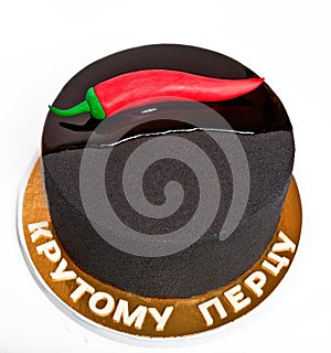 Men`s black cake with red pepper with the inscription in Russian `Cool peppers`