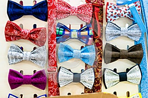Men`s bow ties on the stand for demonstration