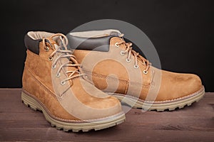 Men`s brown leather boots. Stylish winter shoes