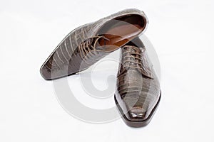 Men`s brown shoes on a white background