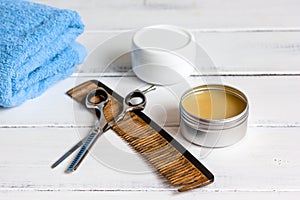 Men`s cosmetics for hair care on wooden background