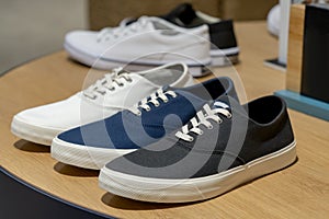 Men`s fashion casual sneaker sport shoes on a shop