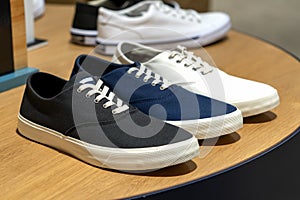 Men`s fashion casual sneaker sport shoes on a shop