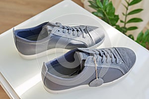 Men`s fashionable gray leather sneakers, casual design