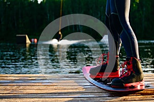 men s feet on a wakeboard