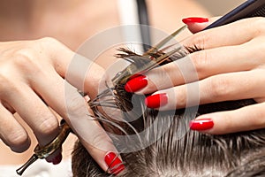 Men`s hair cutting scissors in a beauty salon