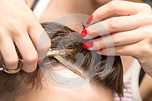 Men`s hair cutting scissors in a beauty salon