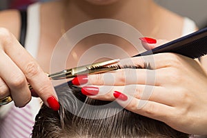 Men`s hair cutting scissors in a beauty salon