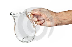 Men\'s hand holding glass water jug isolated on white background