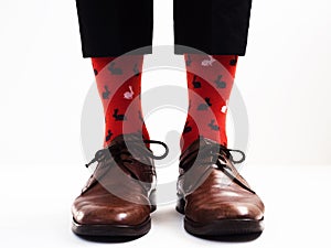 Men`s legs in bright, funny socks