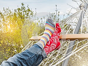 Men& x27;s legs and bright socks. Close-up, outdoor