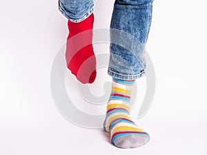 Men`s legs and bright socks. Without shoes