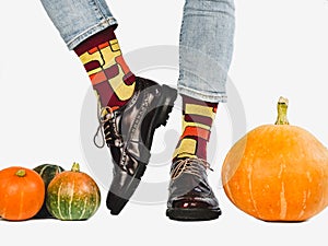 Men`s legs, fashionable shoes and colorful socks