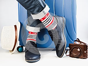 Men`s legs, trendy shoes and bright socks