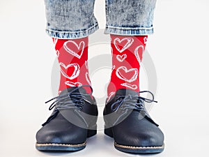 Men`s legs, trendy shoes and bright socks