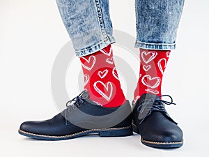 Men`s legs, trendy shoes and bright socks