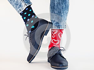 Men`s legs, trendy shoes and bright socks