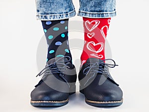 Men`s legs, trendy shoes and bright socks