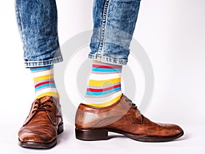 Men& x27;s legs, trendy shoes and bright socks