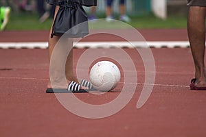 Men`s Legs with White Soccer Ball