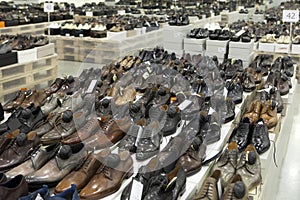 , Men`s shoes in a giant shopping center. Pandemic. No visitors