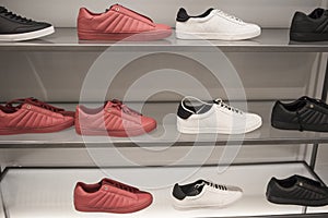 Men`s sports shoes in the store