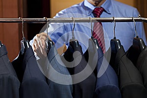 Men`s suits hanging