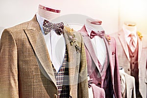 Men`s tuxedo with shirts and ties in store